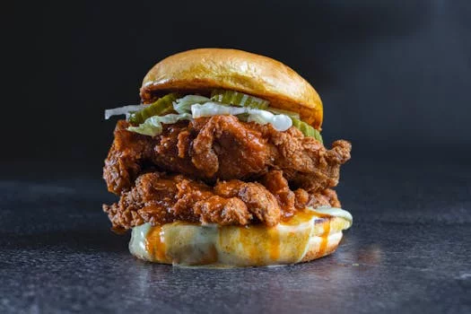 crispy chicken sandwich with pickles and sauce